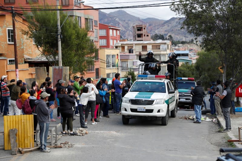 Members of the security forces patrol the streets in La Paz