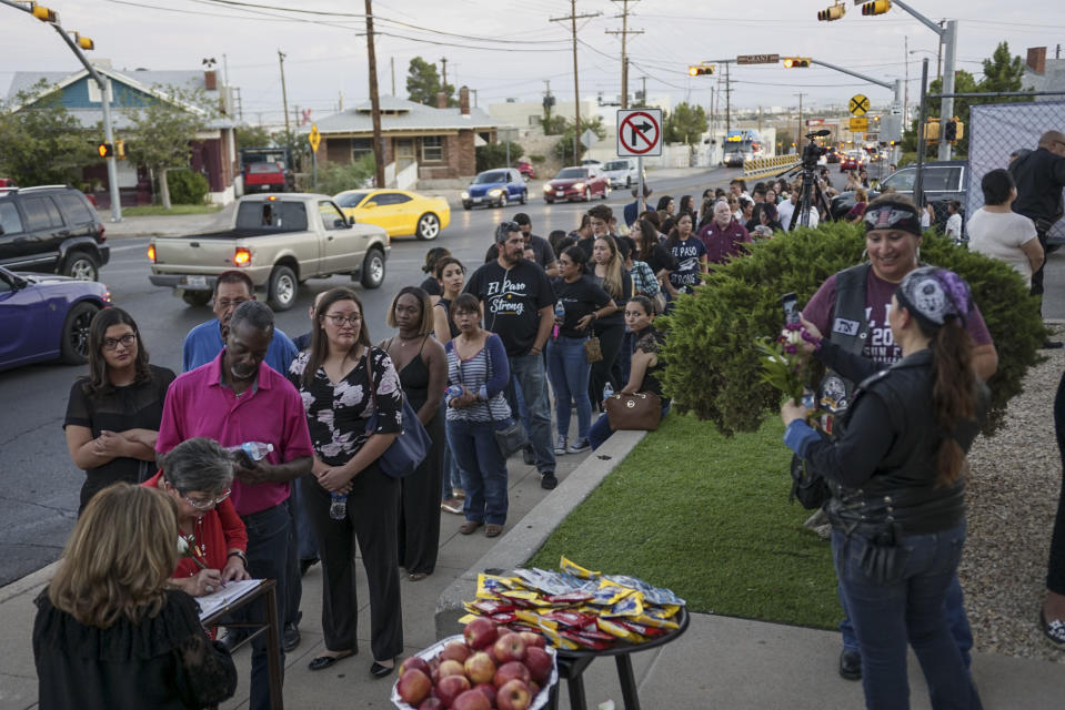 Tribute: Well wishers stand in line to pay their respects on Saturday morning (Getty)