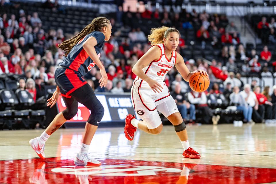 Javyn Nicholson (35) driving into the paint at a game between the Georgia Bulldogs and Ole Miss Rebels at Stegeman Coliseum in Athens, Georgia on Sunday, January 21st, 2024.