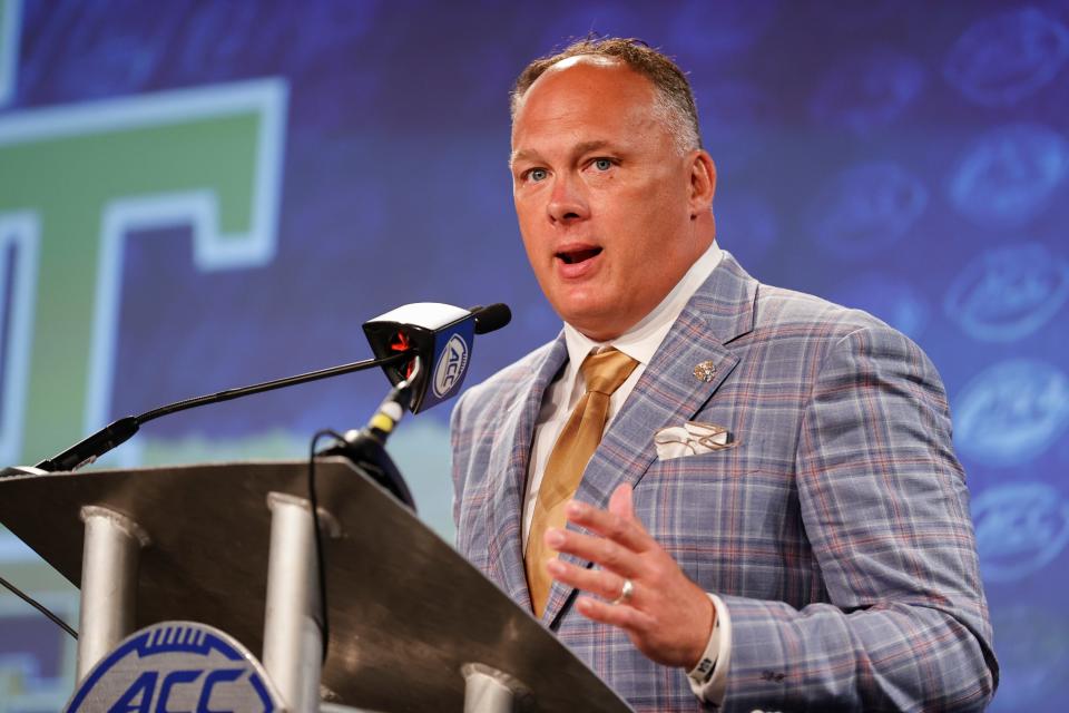 Georgia Tech head coach Geoff Collins answers a question at the NCAA college football Atlantic Coast Conference Media Days in Charlotte, N.C., Thursday, July 21, 2022. (AP Photo/Nell Redmond)