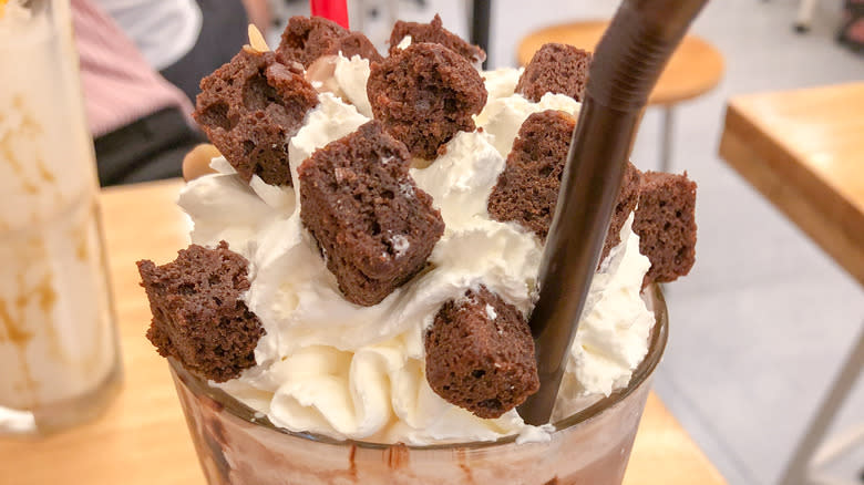 milkshake topped with brownie