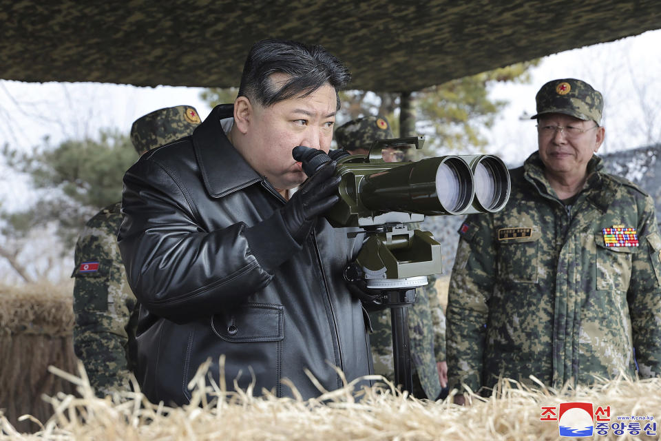 FILE - In this photo provided by the North Korean government, North Korean leader Kim Jong Un, left, supervises artillery firing drills in North Korea Thursday, March 7, 2024. Independent journalists were not given access to cover the event depicted in this image distributed by the North Korean government. The content of this image is as provided and cannot be independently verified. Korean language watermark on image as provided by source reads: "KCNA" which is the abbreviation for Korean Central News Agency. (Korean Central News Agency/Korea News Service via AP, File)