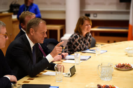 President of the European Council Donald Tusk sits at a meeting table at Government buildings in Dublin, Ireland, December 1, 2017. REUTERS/Clodagh Kilcoyne