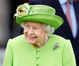 <p>A sweet snap of the Queen attending a polo match in a signature vibrant ensemble. </p>