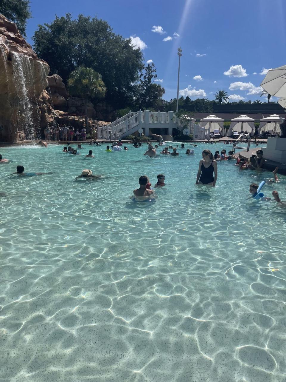 a large pool of water with people in it
