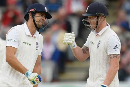 England's Ben Stokes with Alastair Cook (L). Action Images via Reuters / Philip Brown