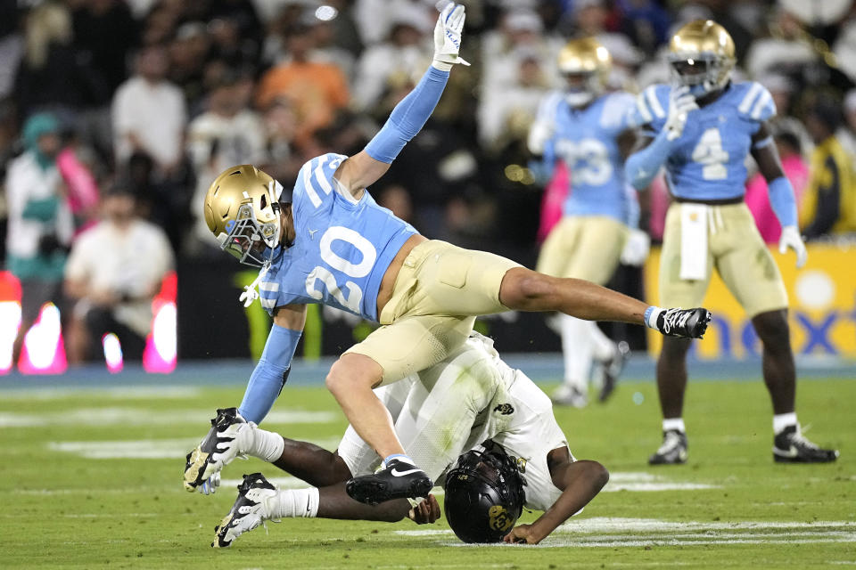 Colorado quarterback Shedeur Sanders, below, is sacked by UCLA linebacker Kain Medrano during the second half of an NCAA college football game Saturday, Oct. 28, 2023, in Pasadena, Calif. (AP Photo/Mark J. Terrill)