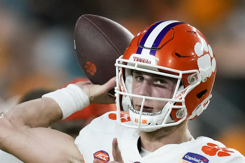FILE - Clemson quarterback Cade Klubnik warms up for the team's Orange Bowl NCAA college football game against Tennessee, Friday, Dec. 30, 2022, in Miami Gardens, Fla. Clemson opens their season on Sept. 4 at Duke. (AP Photo/Rebecca Blackwell, File)