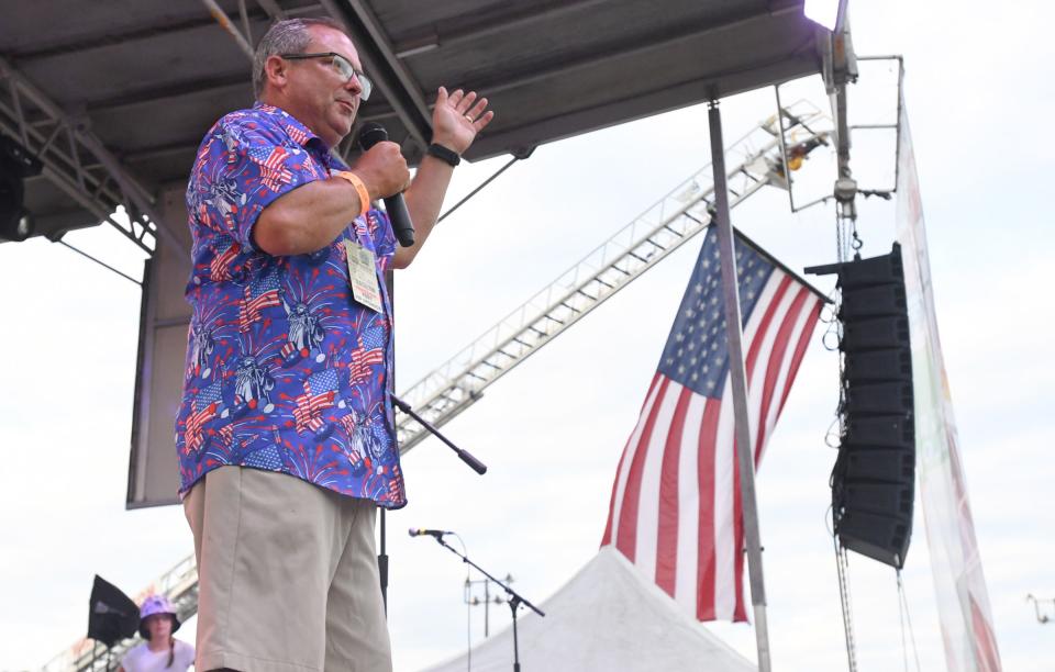 Williamston Mayor Rockey Burgess announces to the public that $750,000 in playground improvements are on the way at Mineral Spring Park, in between live music performances during the 4th of July Freedom Celebration Fireworks and Concert in Williamston, South Carolina, on Saturday, 29 June 2024.