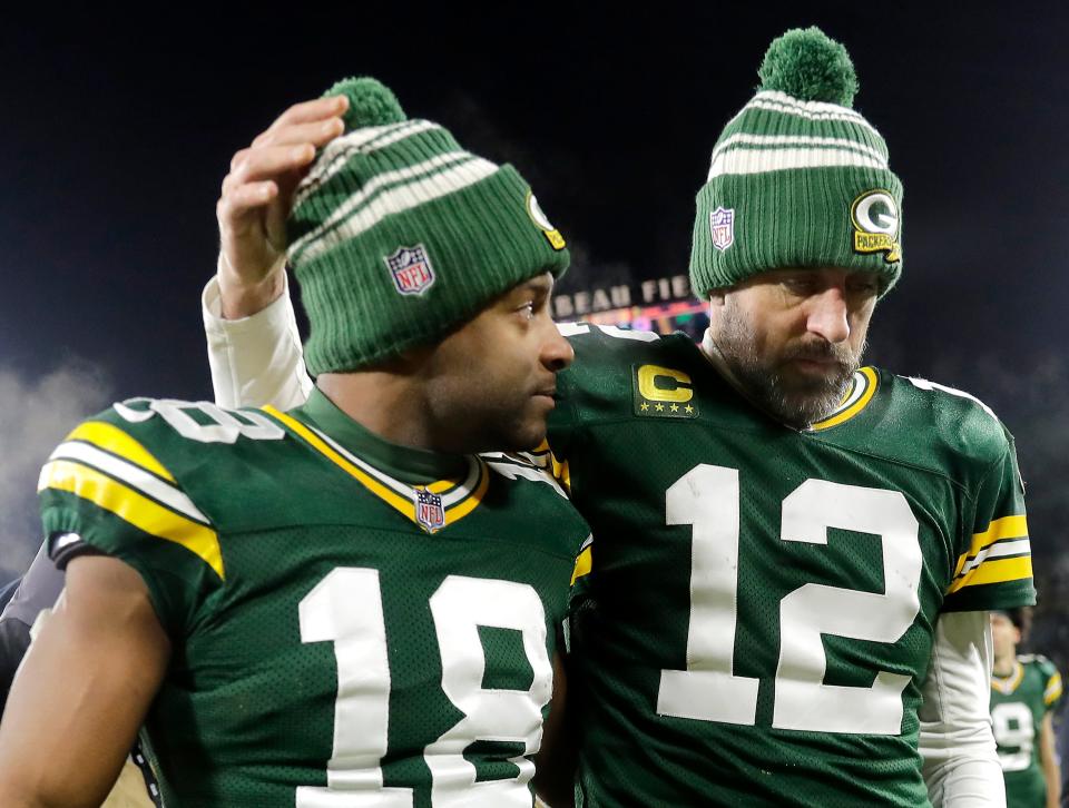 Green Bay Packers quarterback Aaron Rodgers (12) and wide receiver Randall Cobb (18) leave the field after losing to the Detroit Lions 20-16 during their football game on Sunday, January, 8, 2023 at Lambeau Field in Green Bay, Wis. 
Wm. Glasheen USA TODAY NETWORK-Wisconsin