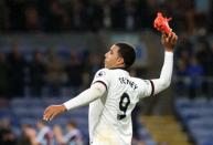 Britain Football Soccer - Burnley v Watford - Premier League - Turf Moor - 26/9/16 Watford's Troy Deeney throws his boot into their fans after the match Reuters / Scott Heppell