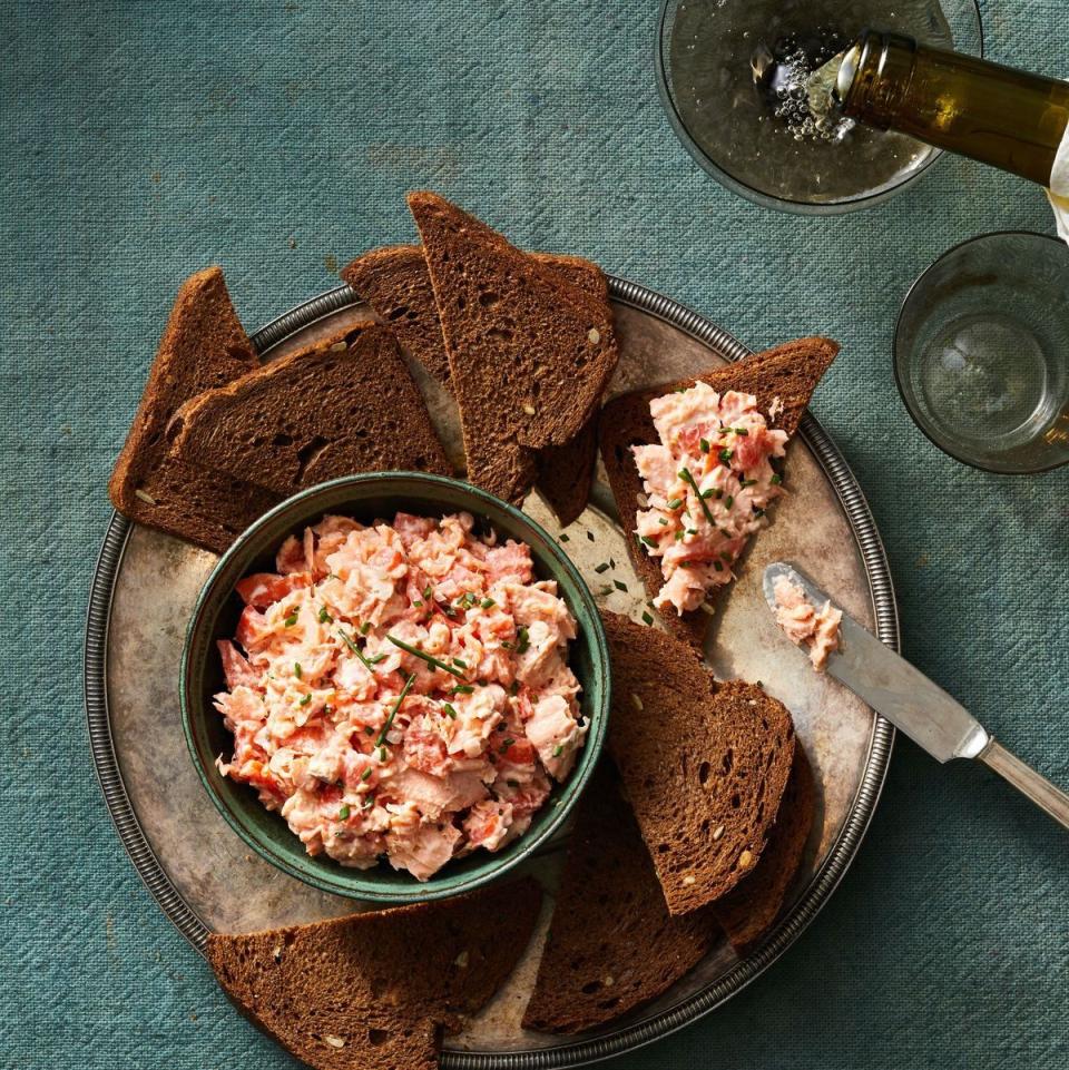 <p>When poached and smoked salmon come together, you get this delicious and savory spread!<br><br>Get the <a href="https://www.goodhousekeeping.com/food-recipes/party-ideas/a41791777/salmon-rillette-recipe/" rel="nofollow noopener" target="_blank" data-ylk="slk:Salmon Rillette recipe;elm:context_link;itc:0;sec:content-canvas" class="link "><strong>Salmon Rillette recip</strong><strong>e</strong></a>. <br></p>