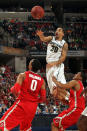 INDIANAPOLIS, IN - MARCH 11: Brandon Wood #30 of the Michigan State Spartans passes the ball against the Ohio State Buckeyes during the Final Game of the 2012 Big Ten Men's Conference Basketball Tournament at Bankers Life Fieldhouse on March 11, 2012 in Indianapolis, Indiana. (Photo by Jonathan Daniel/Getty Images)