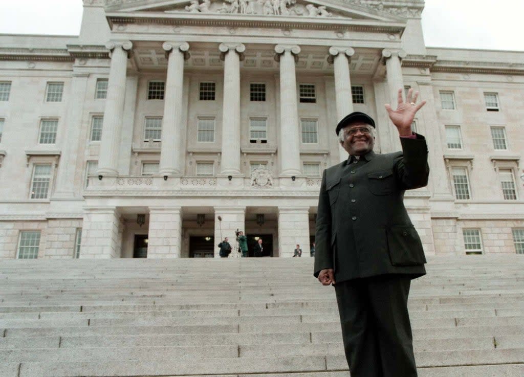 Archbishop Desmond Tutu on the steps of Stormont in 1998 (Brian Little/PA) (PA Archive)