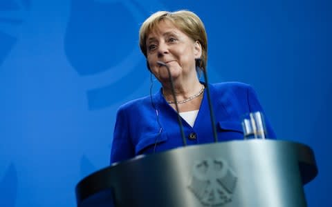 Merkel - Credit: CLEMENS BILAN/EPA-EFE/REX