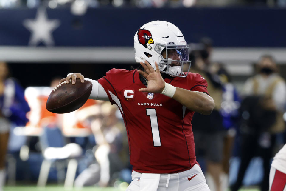 Arizona Cardinals quarterback Kyler Murray (1) throws a pass against the Dallas Cowboys during the first half of an NFL football game Sunday, Jan. 2, 2022, in Arlington, Texas. (AP Photo/Ron Jenkins)