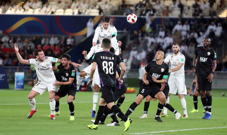 Soccer Football - Club World Cup - Final - Real Madrid v Al Ain - Zayed Sports City Stadium, Abu Dhabi, United Arab Emirates - December 22, 2018 Real Madrid's Sergio Ramos scores their third goal REUTERS/Suhaib Salem