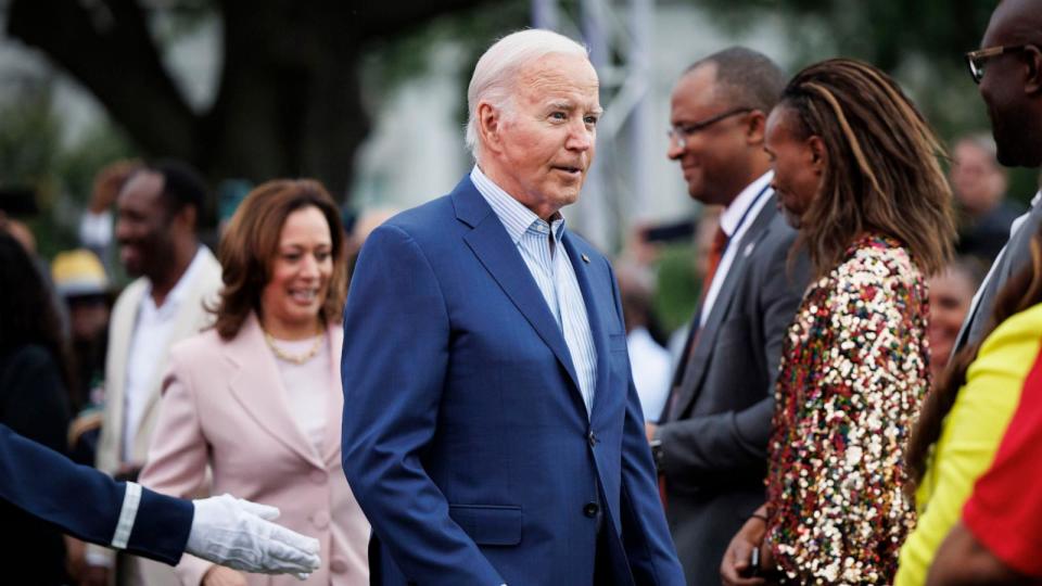 PHOTO: President Joe Biden, center, during a Juneteenth concert on the South Lawn of the White House, June 10, 2024.  (Ting Shen/Bloomberg via Getty Images)