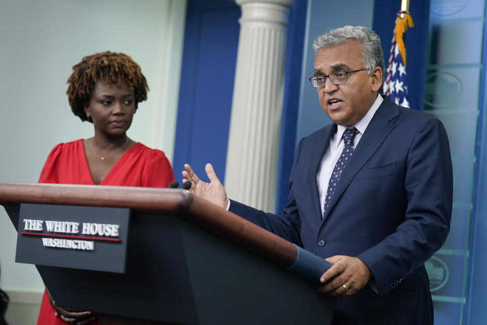 White House Covid Response Coordinator Ashish Jha speaks about President Joe Biden's positive COVID-19 test during a briefing at the White House, Thursday, July 21, 2022, in Washington. White House press secretary Karine Jean-Pierre listens at left. (AP Photo/Evan Vucci)