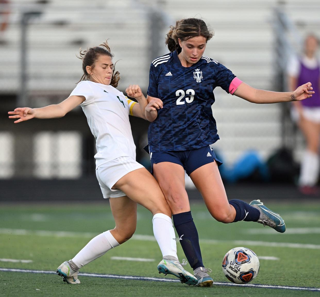 Nordonia's Noelle Dubnicka and Twinsburg's Brenna Utrup battle for the ball during the first half of a soccer game, Wednesday, Sept. 7, 2022, in Twinsburg, Ohio.