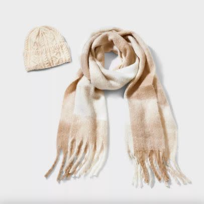 An expensive-looking blanket scarf that comes with a matching beanie