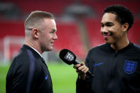 Rooney speaks to FA TV presenter Craig Mitch before kick-off (Nick Potts/PA)