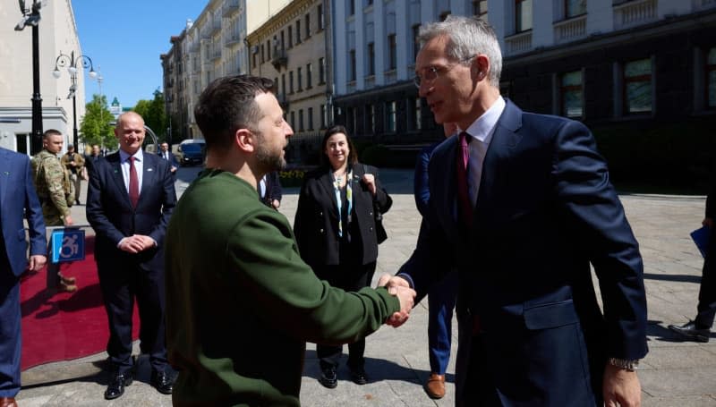 NATO Secretary General Jens Stoltenberg received by President Volodymyr Zelenskyy of Ukraine. "The lack of ammunition has enabled the Russians to push forward along the front line," Stoltenberg said, singling out the United States for Washington's protracted process to send more military aid. -/NATO/dpa