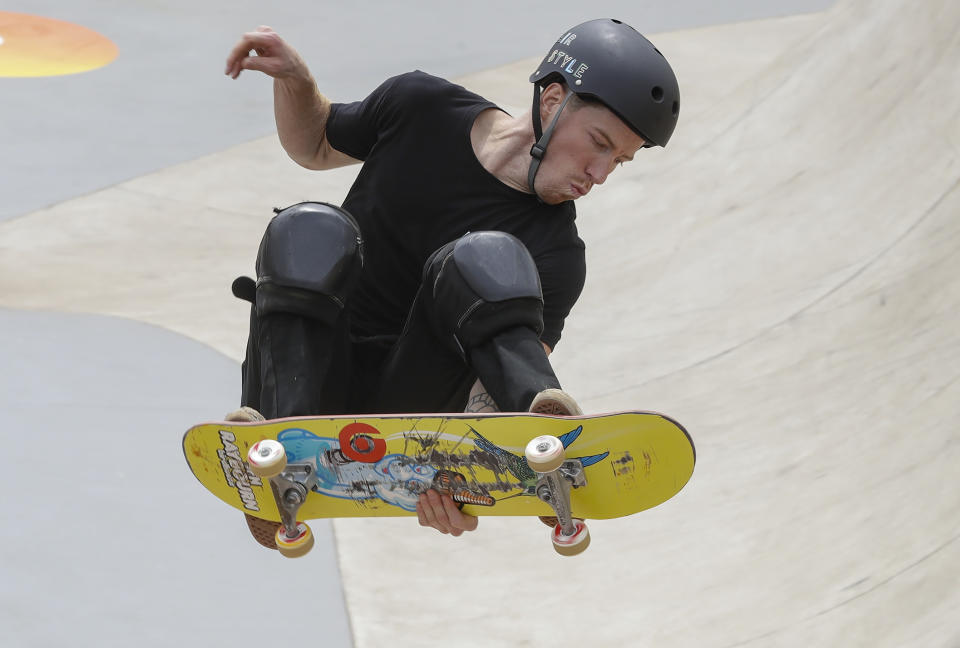 FILE - In this Sept. 13, 2019, file photo, Shaun White competes during the Skate Park World Championship in Sao Paulo, Brazil. If the world sees Shaun White at an Olympics again, it will be in 2022, not later this year. The three-time snowboarding champion told The Associated Press that he is taking skateboarding off his plate and won’t try to qualify for that sport’s Olympic debut later this year in Tokyo. (AP Photo/Andre Penner)
