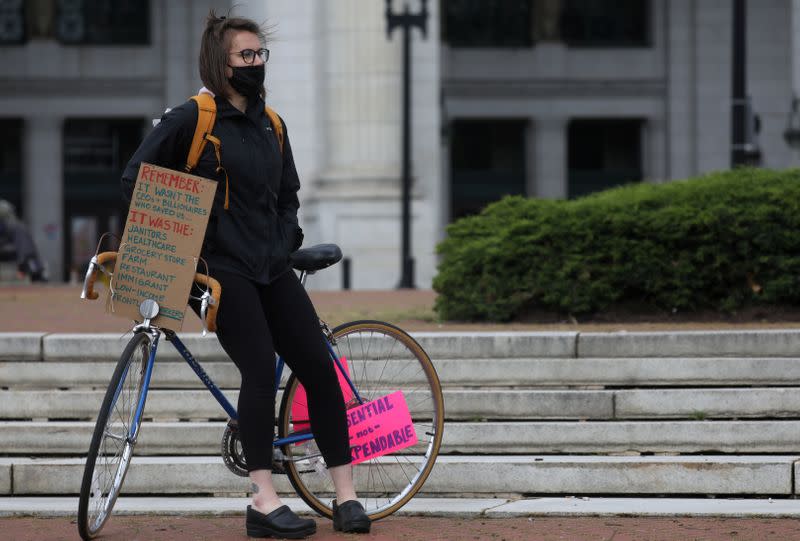 People take part in a "moving protest" on bicycles in Washington, U.S.
