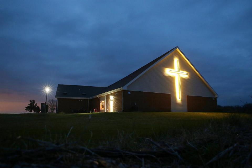 PHOTO: In this April 12, 2015, file photo, a cross is illuminated on the exterior of the New Hope Church in Adel, Iowa.  (Justin Sullivan/Getty Images, FILE)