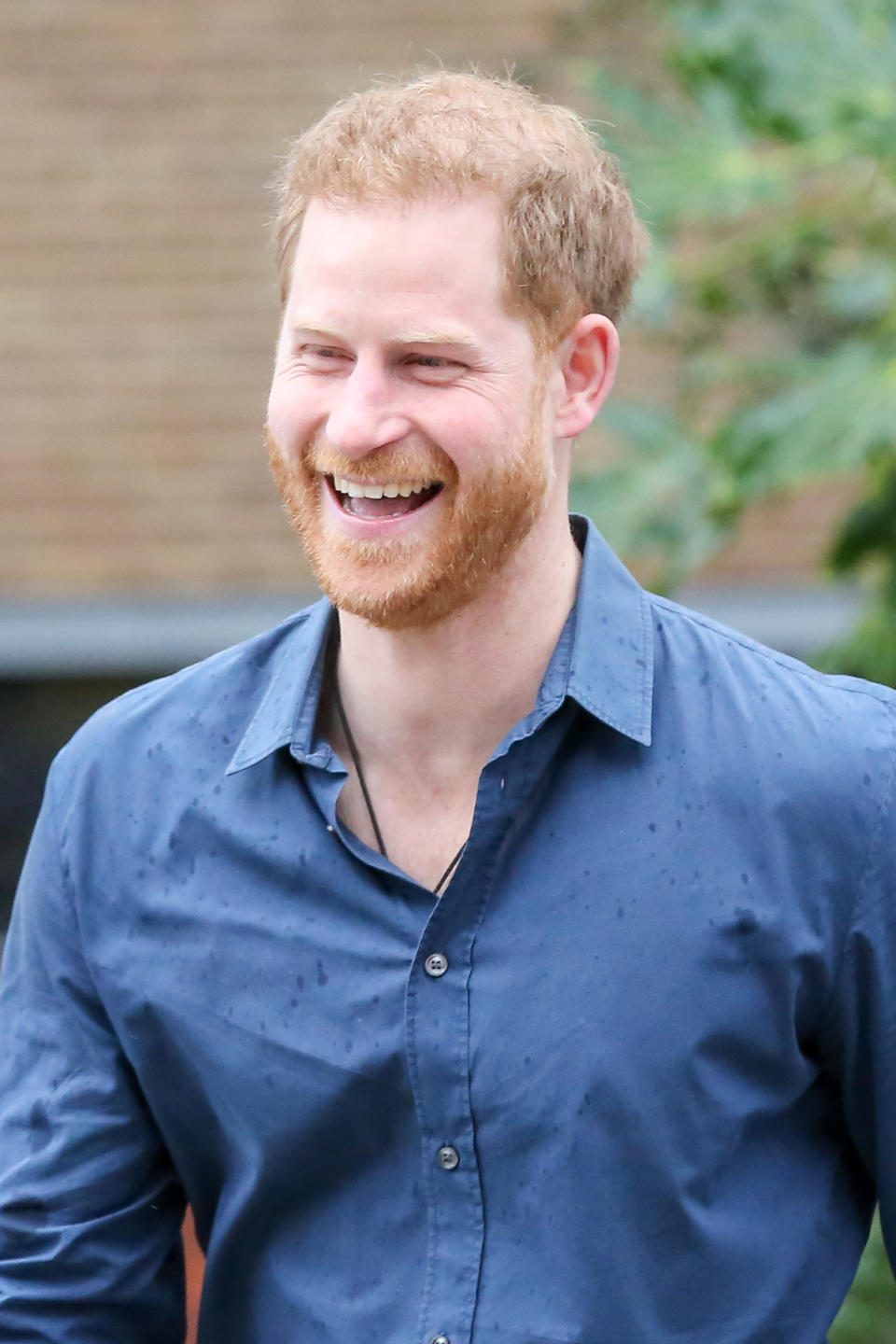 Prince Harry laughs outside Abbey Road Studios in London, United Kingdom on February 28, 2020. 