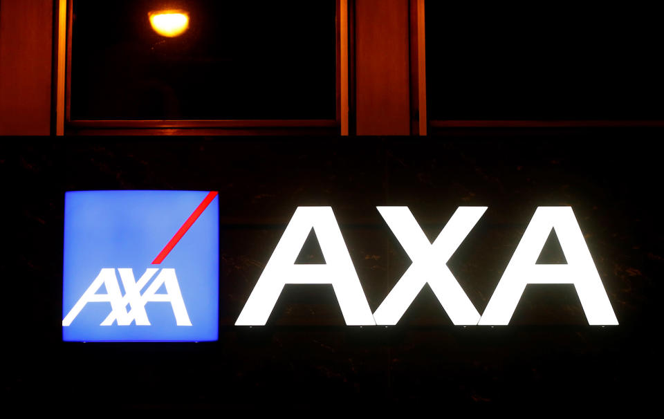 The logo of AXA insurance is seen at an office building in Basel, Switzerland March 2, 2020. REUTERS/Arnd Wiegmann - RC2PBF9JEF7Y