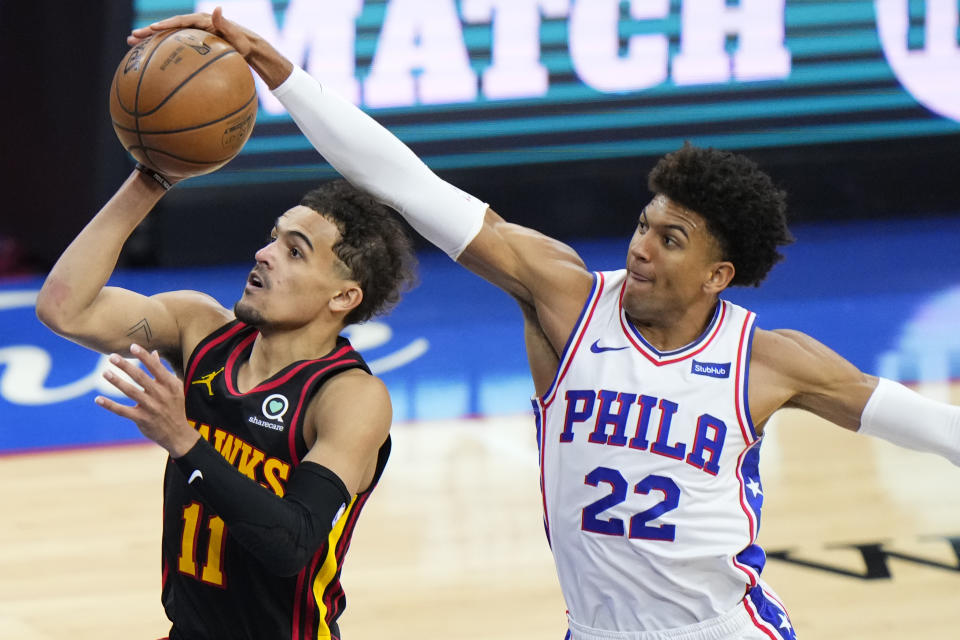 Philadelphia 76ers' Matisse Thybulle, right, blocks a shot by Atlanta Hawks' Trae Young during the second half of Game 7 in a second-round NBA basketball playoff series, Sunday, June 20, 2021, in Philadelphia. (AP Photo/Matt Slocum)