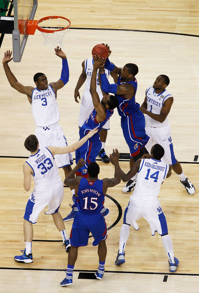 Thomas Robinson #0 of the Kansas Jayhawks jumps over a teammate for a rebound in the first half against the Kentucky Wildcats in the National Championship Game of the 2012 NCAA Division I Men's Basketball Tournament at the Mercedes-Benz Superdome on April 2, 2012 in New Orleans, Louisiana. (Photo by Chris Graythen/Getty Images)