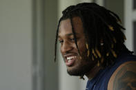 Tennessee Titans first round draft pick offensive tackle JC Latham speaks to the media after an NFL rookie minicamp football practice Friday, May 10, 2024, in Nashville, Tenn. (AP Photo/George Walker IV)