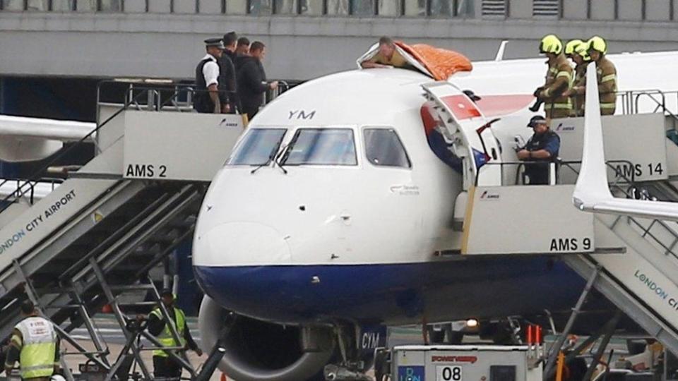 James Brown on top of the plane at London City Airport (Extinction Rebellion/PA) (PA Media)