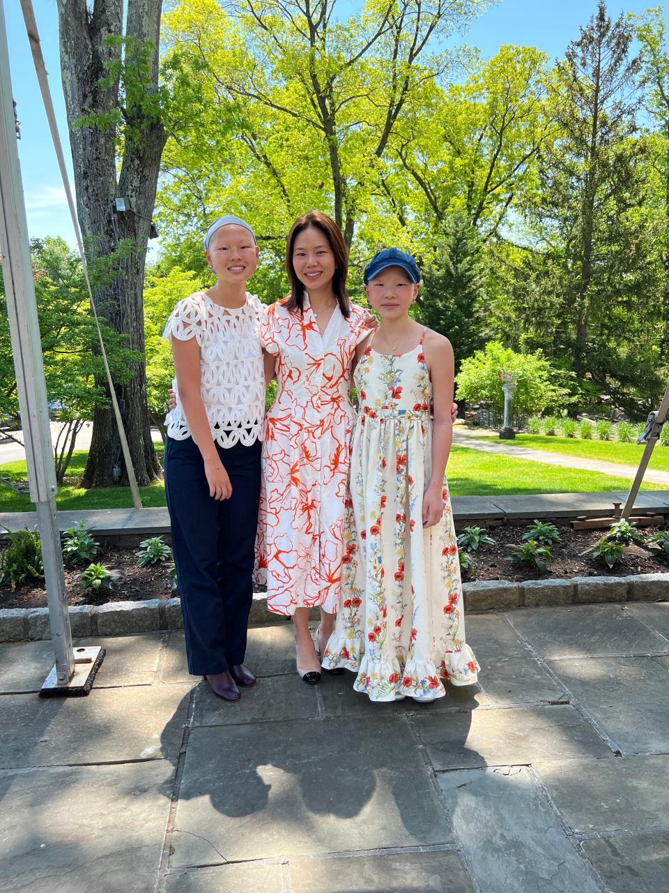 From left to right: Alison Lee, 17, her mother Julie Yoo, 47, and her younger sister Madeline Lee, 13.