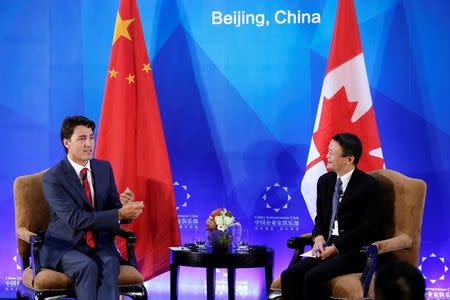 Canada's Prime Minister Justin Trudeau (L) and Chairman and chief executive of Alibaba Group Jack Ma attend the China Entrepreneur Club Leaders Forum in Beijing, China, August 30, 2016. REUTERS/Jason Lee