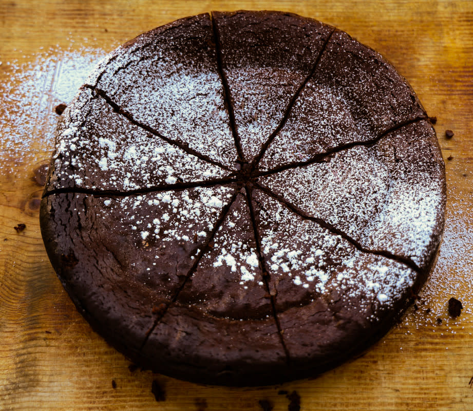 <p>Courtesy of Moveable Feast</p><p>This chocolate cake has an earthy, rich, slightly bitter flavor, which pairs really well with <a href="https://parade.com/1079372/melissasperka/best-cinnamon-recipes/" rel="nofollow noopener" target="_blank" data-ylk="slk:cinnamon;elm:context_link;itc:0;sec:content-canvas" class="link ">cinnamon</a>, smoky chipotle chile powder and a touch of <a href="https://parade.com/1232869/kaitlin-vogel/cayenne-pepper-benefits/" rel="nofollow noopener" target="_blank" data-ylk="slk:cayenne;elm:context_link;itc:0;sec:content-canvas" class="link ">cayenne</a> for a little heat. </p><p><strong>Get the recipe: </strong><strong><a href="https://www.yahoo.com/lifestyle/flourless-mexican-chocolate-cake-sweet-153000611.html" data-ylk="slk:Flourless Mexican Chocolate Cake;elm:context_link;itc:0;sec:content-canvas;outcm:mb_qualified_link;_E:mb_qualified_link;ct:story;" class="link  yahoo-link">Flourless Mexican Chocolate Cake</a></strong></p>