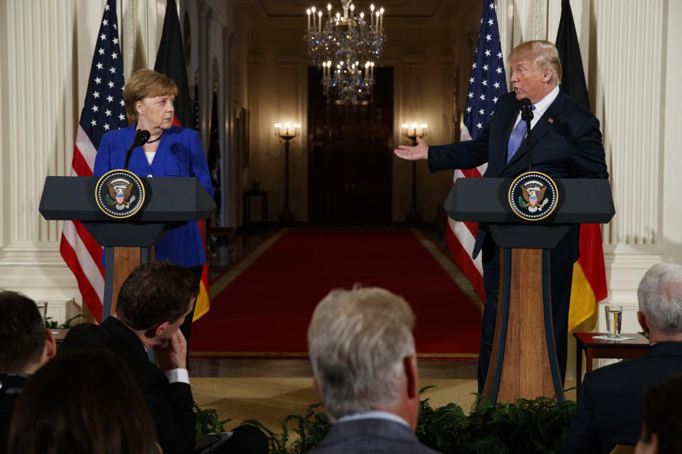 In this Friday, April 27, 2018 photo, President Donald Trump speaks during a news conference with German Chancellor Angela Merkel in the East Room of the White House in Washington. After more than a year of thinly veiled threats that the United States could start pulling troops out of Germany unless the country increases its defense spending to NATO standards, President Donald Trump appears to be going ahead with the hardball approach with a plan to reduce the American military presence in the country by more than 25 percent. (AP Photo/Evan Vucci)