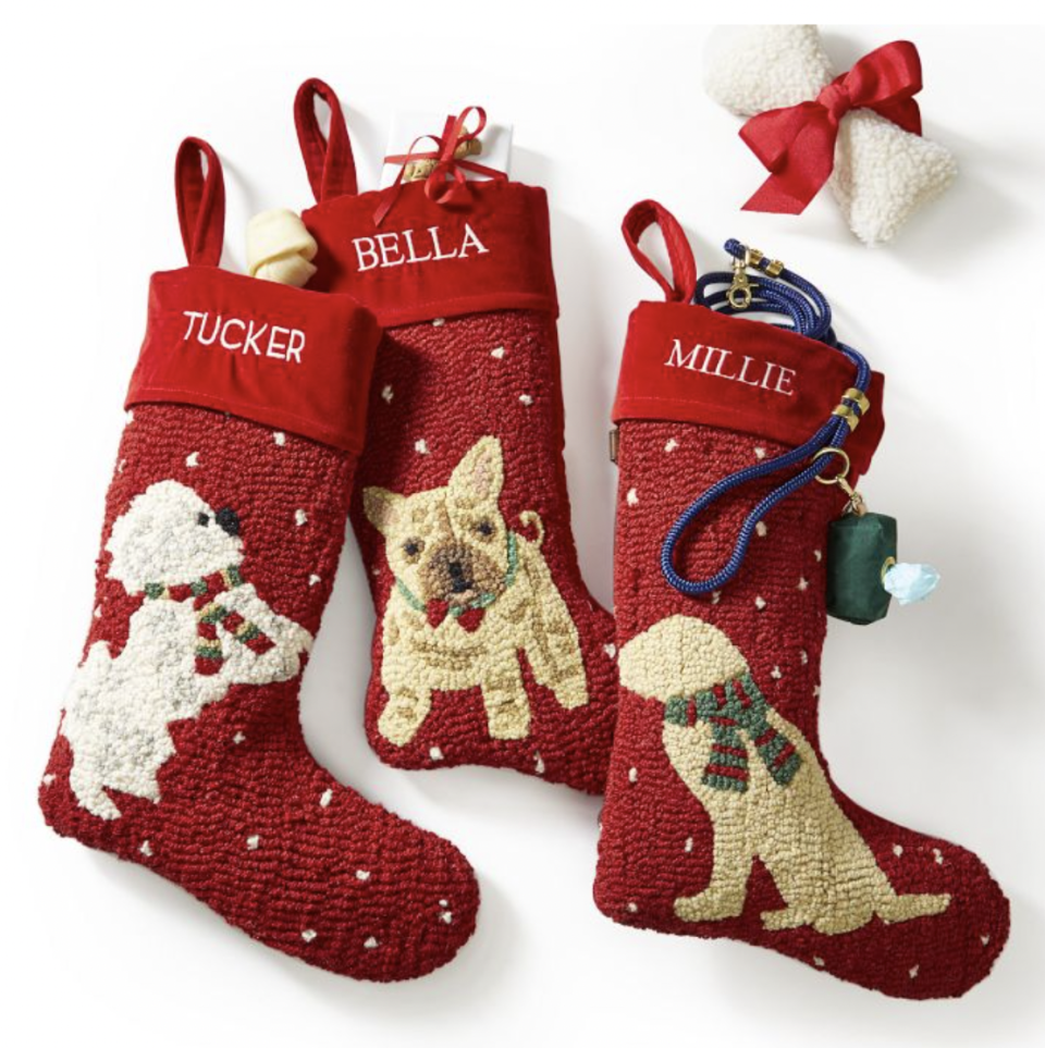 <p><a href="https://go.redirectingat.com?id=74968X1596630&url=https%3A%2F%2Fwww.markandgraham.com%2Fproducts%2Fhand-hooked-pet-stockings%2F%3FcatalogId%3D50%26sku%3D5084013%26cm_ven%3DPLA%26cm_cat%3DGoogle%26cm_pla%3DHome%2B%253E%2BFrames%2B%252B%2BDecor%26region_id%3D669950%26cm_ite%3D5084013_19893848377%26gclid%3DEAIaIQobChMI_e_7n4_sgQMVGvzICh3sOA8XEAQYDSABEgLT-vD_BwE&sref=https%3A%2F%2Fwww.thepioneerwoman.com%2Fhome-lifestyle%2Fpets%2Fg37677370%2Fdog-christmas-stockings%2F" rel="nofollow noopener" target="_blank" data-ylk="slk:Shop Now;elm:context_link;itc:0;sec:content-canvas" class="link ">Shop Now</a></p><p>Hand Hooked Pet Stocking</p><p>markandgraham.com</p><p>$49.00</p><span class="copyright">Mark and Graham</span>