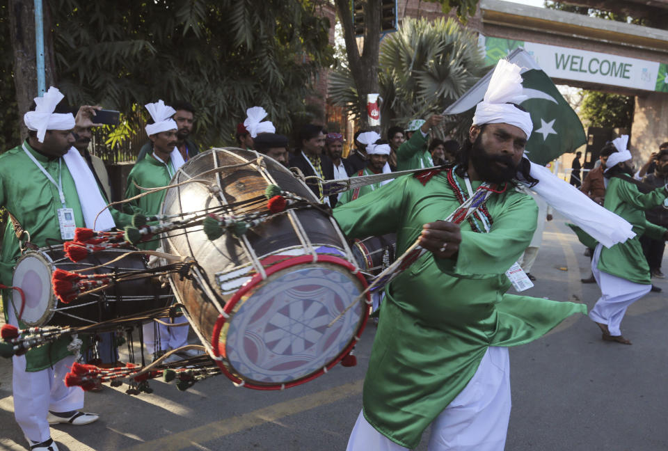 Pakistani drummers perform outside the Gadaffi Stadium ahead of the Pakistani Super League match in Lahore, Pakistan, Friday, Feb. 21, 2020. (AP PhotoK.M. Chaudhry)