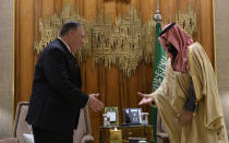 U.S. Secretary of State Mike Pompeo, left, meets with Saudi Arabia's Crown Prince Mohammed bin Salman at Irqah Palace, in Riyadh Saudi Arabia, Thursday, February 20, 2020. Pompeo met with King Salman in the capital, Riyadh, on Thursday. (Andrew Caballero-Reynolds/Pool via AP)