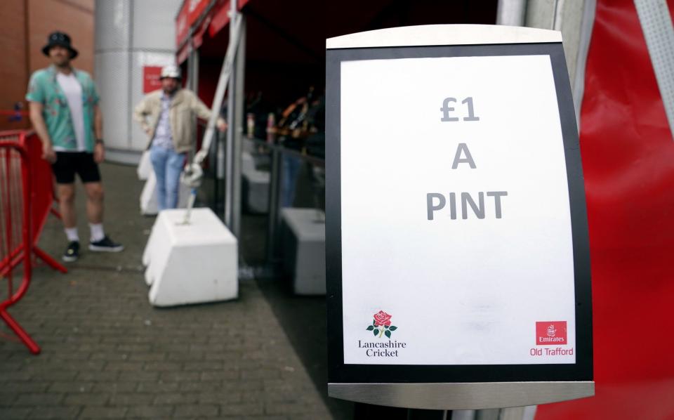 Pints at Old Trafford were sold for £1 after the cancellation - PA