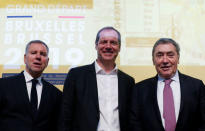 Belgian politician Alain Courtois, Tour de France director Christian Prudhomme and former Belgian cycling champion Eddy Merckx pose during the presentation of the Grand Depart of the 2019 Tour de France cycling race in Brussels, Belgium, January 16, 2018. REUTERS/Francois Lenoir