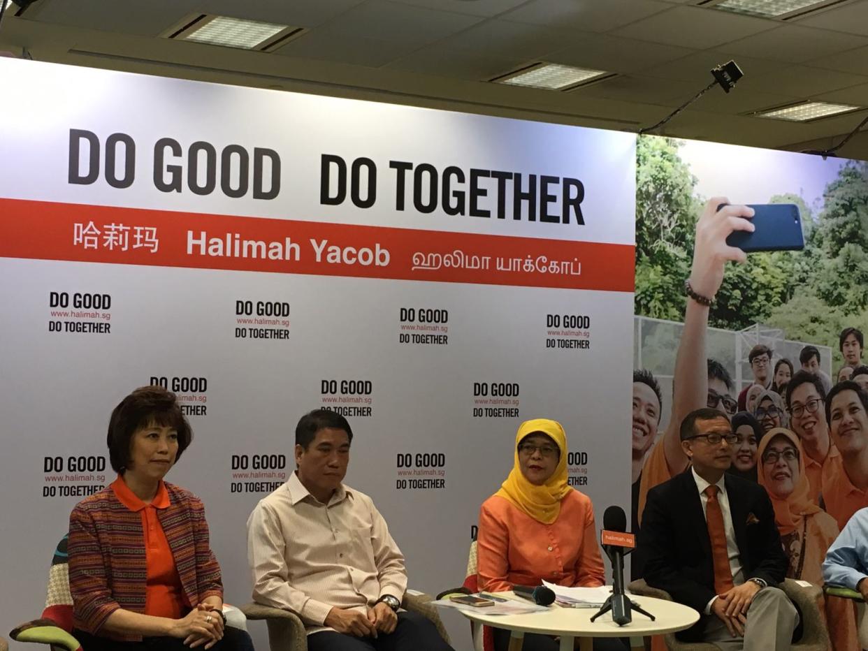 Presidential hopeful Halimah Yacob with members of her campaign team (L-R) NTUC president Mary Liew, former NMP Lawrence Leow and NUS academic Simon Tay. PHOTO: Nicholas Yong