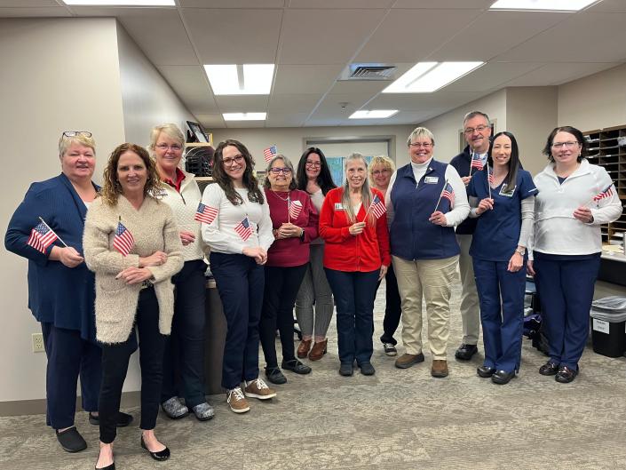 Members of the Hospice Care Team celebrate becoming a Level 5 Partner with the We Honor Veterans Program.