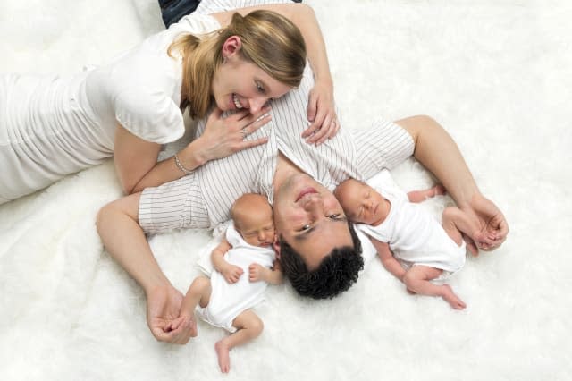 Happy family with twins