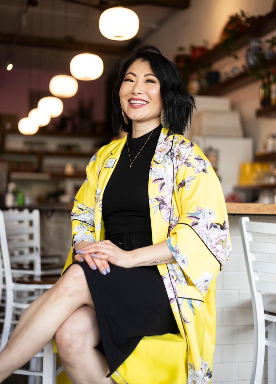 SunAh Laybourn is a University of Memphis sociology professor who led the charge to have Memphis-based programming during Asian American and Pacific Islander Heritage Month in Memphis for the first time this year. She poses for a portrait on May 24, 2023, at the bar inside of Good Fortune in Downtown Memphis.