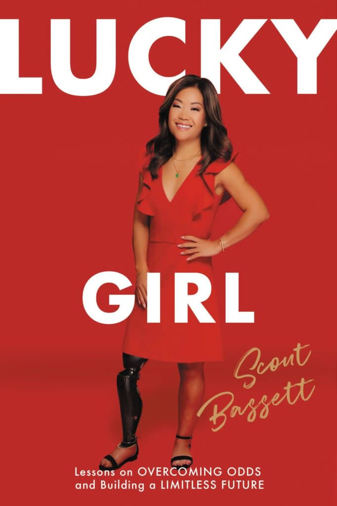 A red book cover of an athlete in a red dress